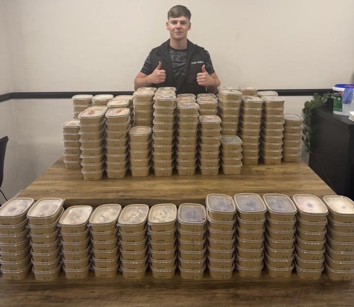 The FoodWorks team with a week’s worth of freshly prepped meals